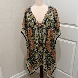 Beautiful tunic top with Beaded neckline!